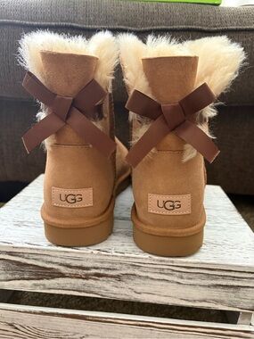 UGG Chestnut Suede Mini Boots with Bow and Cream Shearling